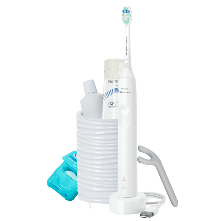 Oral care items for college students laid out on white background.