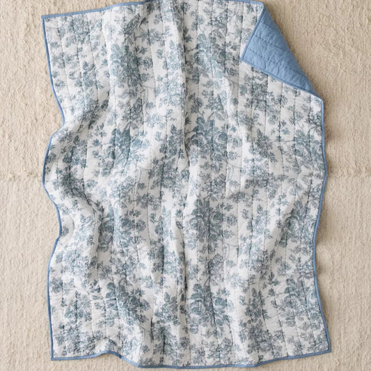 Dorm quilted throw blanket with blue toile
