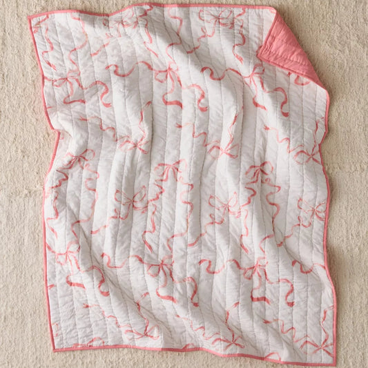 Dorm throw blanket with bows