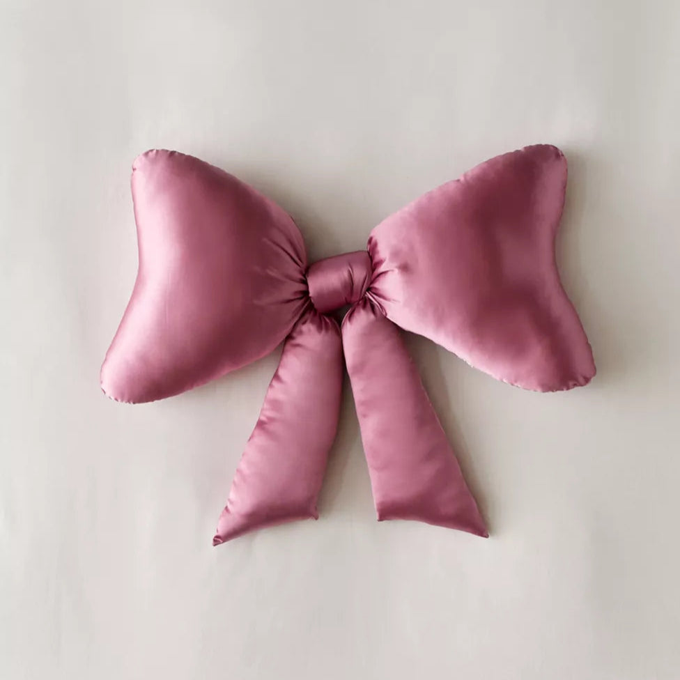 Rosebud dorm bow throw pillow