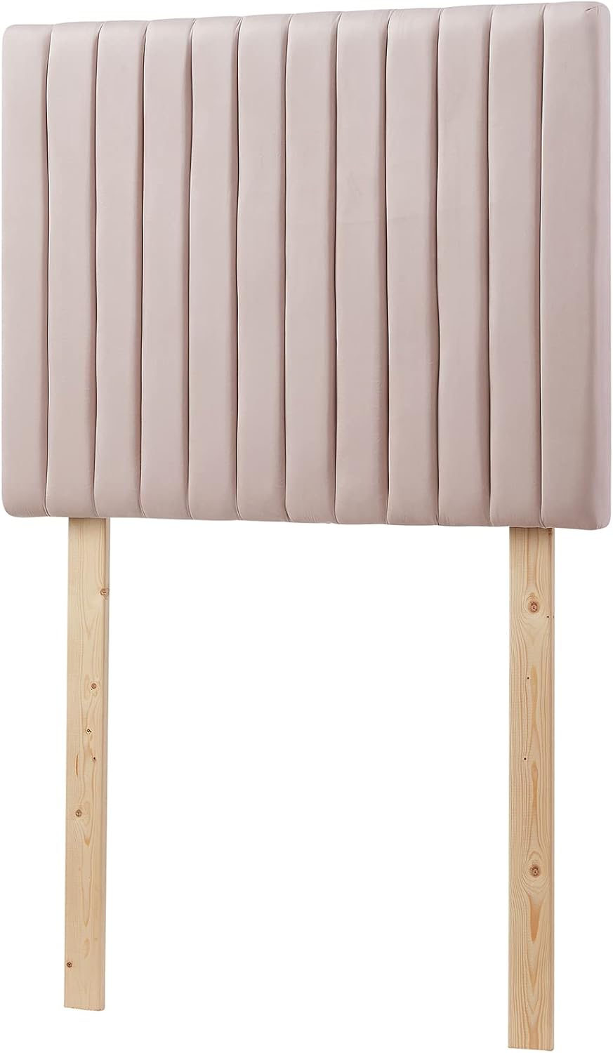 Pink velvet upholstered headboard with wooden legs perfect for dorm decor