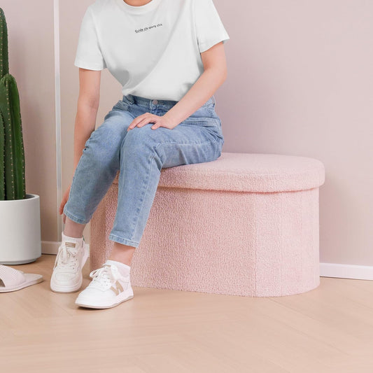 Dorm oval storage ottoman in pink boucle